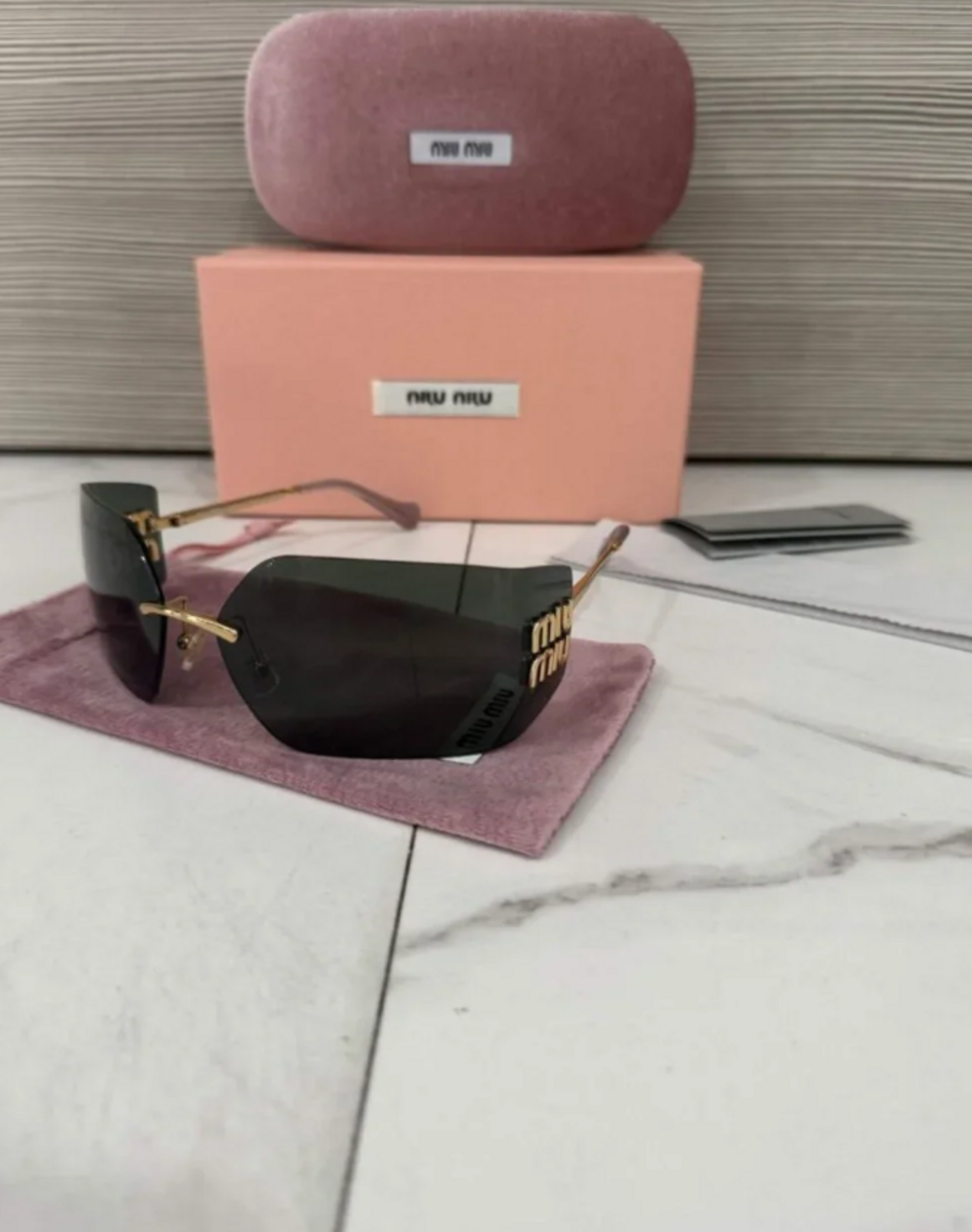 MIU MIU SMU54Y Womenโs Sunglasses